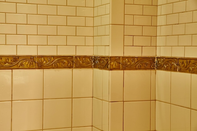 Elegant Cream and Gold Tile Design Eye Level Corner View