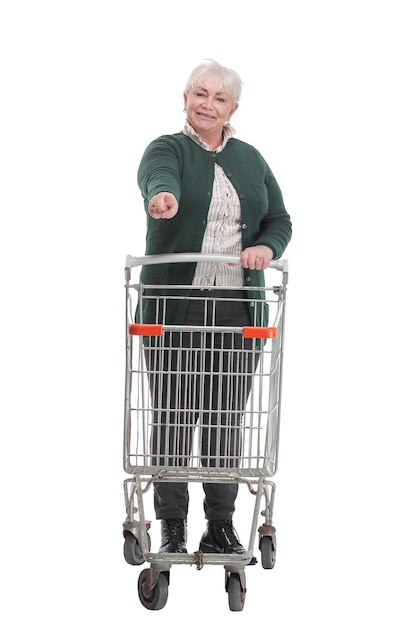 Elegant dressed and happy looking mature woman on her way to go shopping