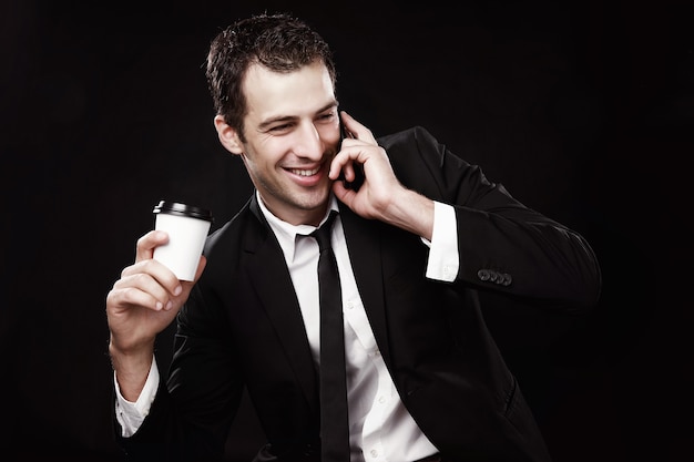 Elegant handsome man with a cup of coffee