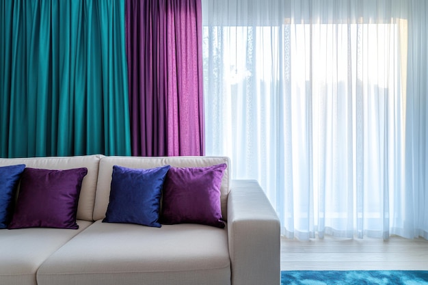 Photo elegant minimalist living room with teal and purple curtains for modern decor