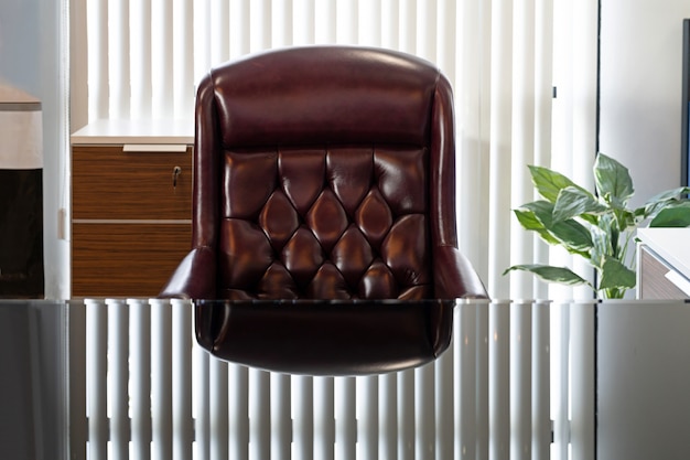 Elegant office Workplace of the head and a classic leather armchair