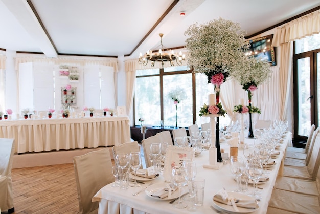 Elegant table arrangement and catering at wedding reception Wedding decoration in restaurant