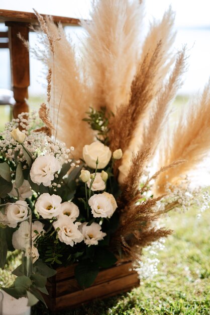 Elegant wedding decorations made of natural flowers and green elements