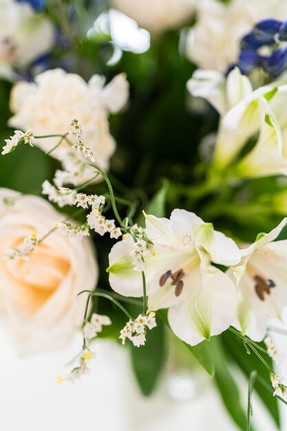 Elegant white rose bouquet adorns a beautiful vase