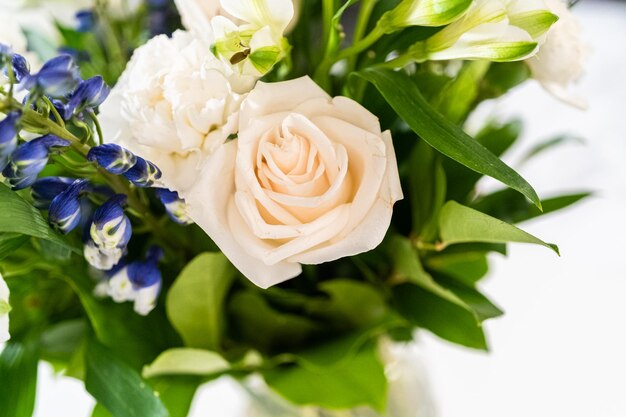 Elegant white rose bouquet adorns a beautiful vase