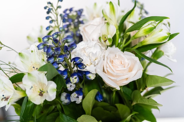 Elegant white rose bouquet adorns a beautiful vase