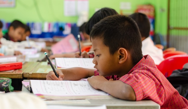 Elementary school student In an Asian school. Teaching and learning activities with classmates