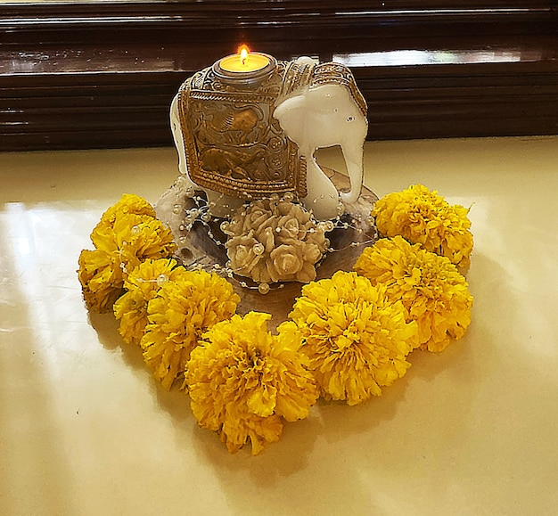 Elephant idol elephant diya elephant candle marigold flowers