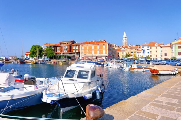 Embankment of the marina and boats in the Adriatic Sea in Izola fishing village, Slovenia