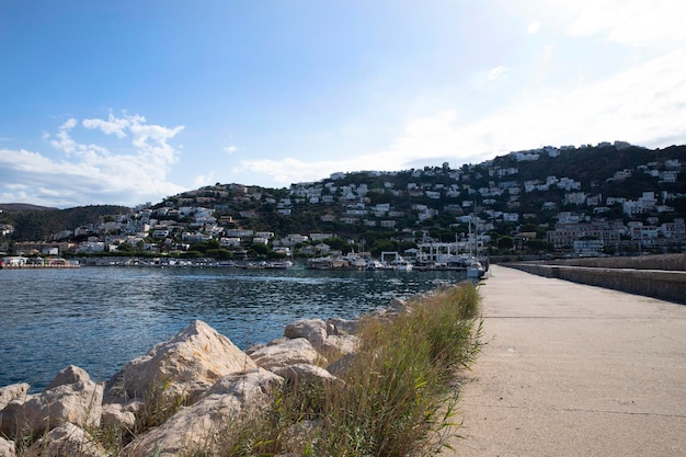 Embankment overlooking the sea the city in the mountains and the pier