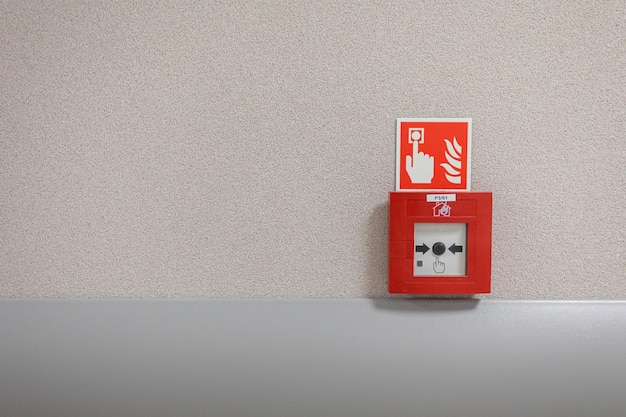 Emergency button in red box to use in case of fire