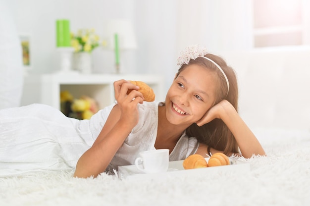 Emotional little girl with breakfast