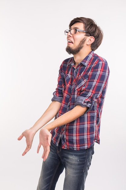 Emotions and people concept - bearded man confused and scared something, looks like he guilty