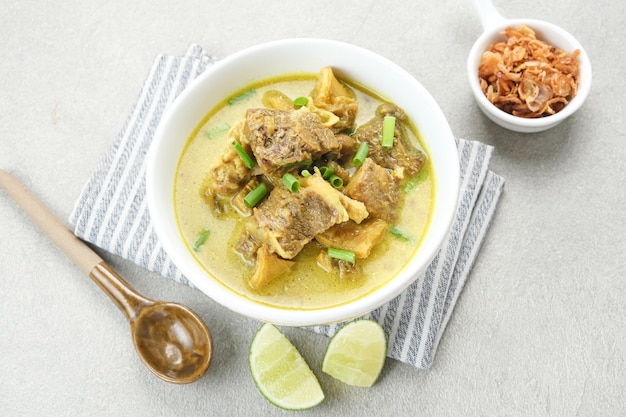 Empal Gentong Cirebon traditional beef soup with coconut milk Indonesian food