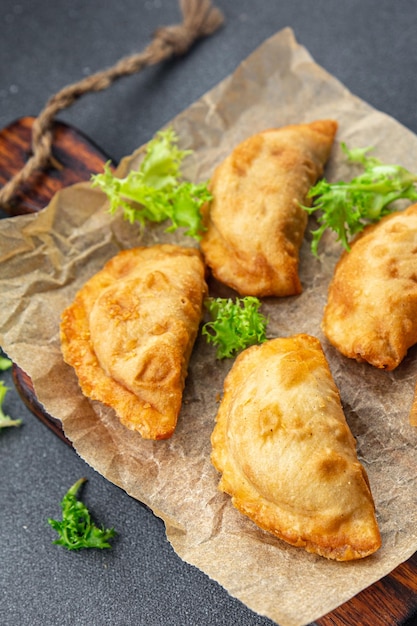 Photo empanadas pies stuffed meat meal food snack on the table copy space food background rustic top view