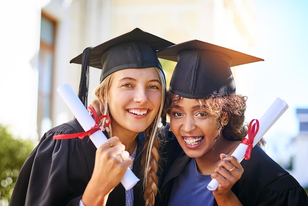 Empower yourself Shot of happy students on graduation day