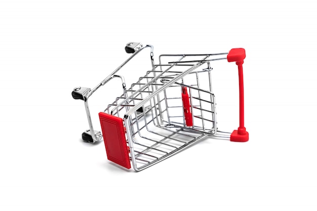 Empty aluminum shopping trolley on a white background