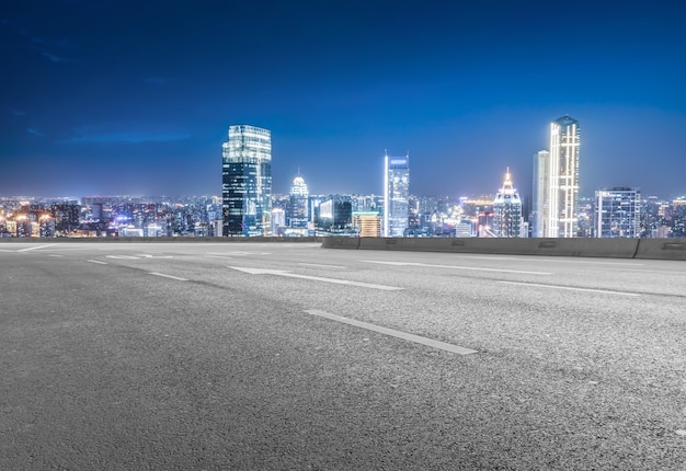 Empty asphalt road and city skyline and building landscape, China.