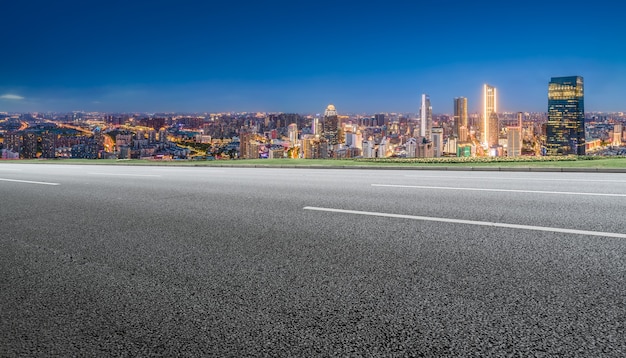 Empty asphalt road and city skyline and building landscape, China.