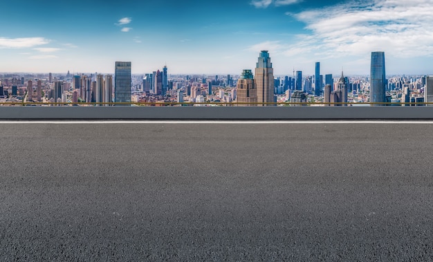 Empty asphalt road and city skyline and building landscape, China.