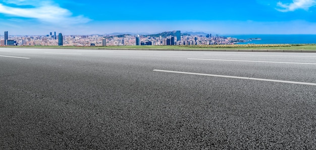 Empty asphalt road and city skyline and building landscape, China.