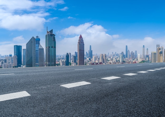 Empty asphalt road and city skyline and building landscape, China.