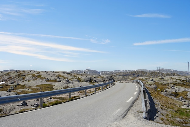 Empty autumn road at the norwegian mountains.