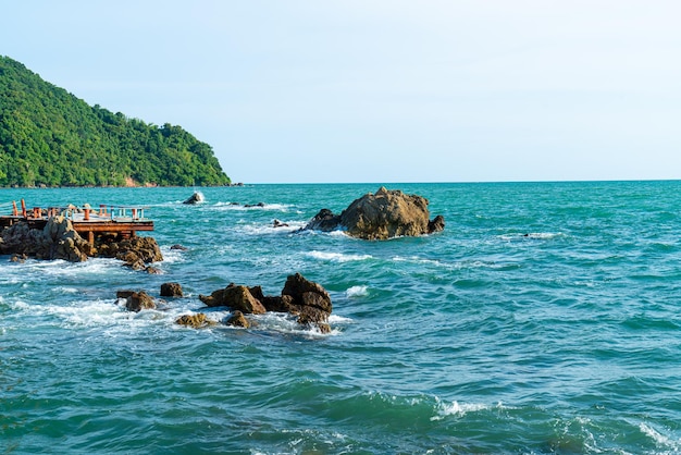 Empty balcony and wooden bench with coast and sea background at Chedi Klang Nam in Chanthaburi Thailand