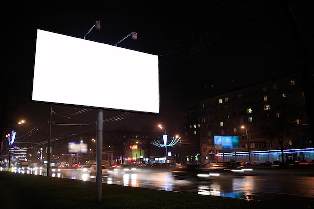 Empty billboard by night