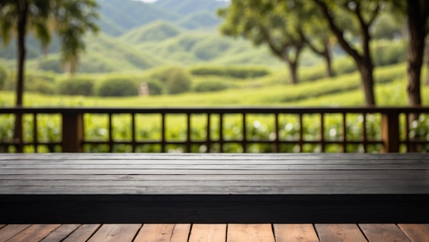 empty black wooden table with blurred background of tea gardens