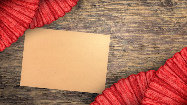 Empty brown paper with a red Chinese fan