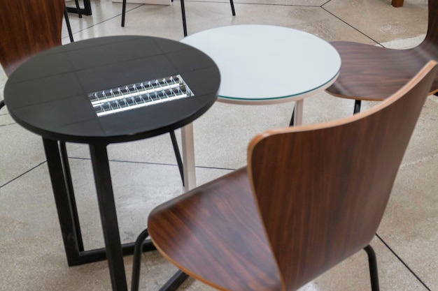 Empty cafeteria or restaurant tables with chairs