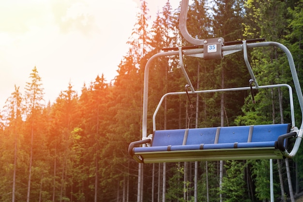 Empty chair ski lift in the summer Vacation in the mountains ecotourism