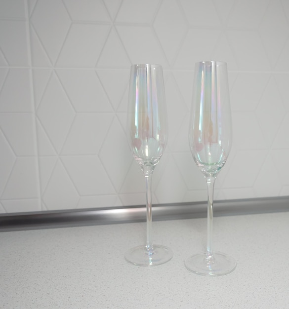 Empty champagne wine glass on isolated white background mockup for drinks and juices crockery transparent glass for juice cocktails