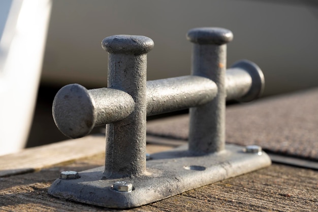 Empty coastal mooring or towing bollard for the boat yacht or vessel