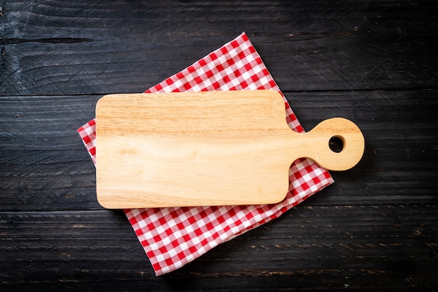 empty cutting wooden board with kitchen cloth