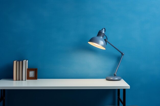 An empty desk with a lamp on top of it with background as a pastel wall