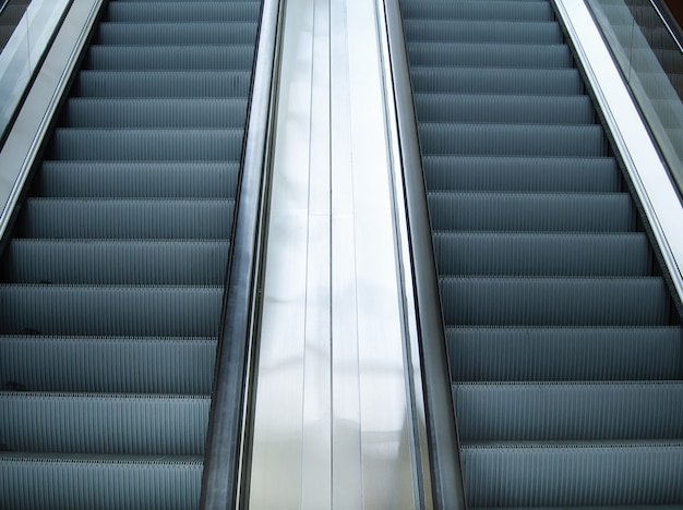 Empty escalator stairs in subway station or shopping mall