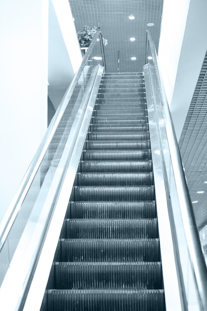 Empty escalator steps on staircase in the airport