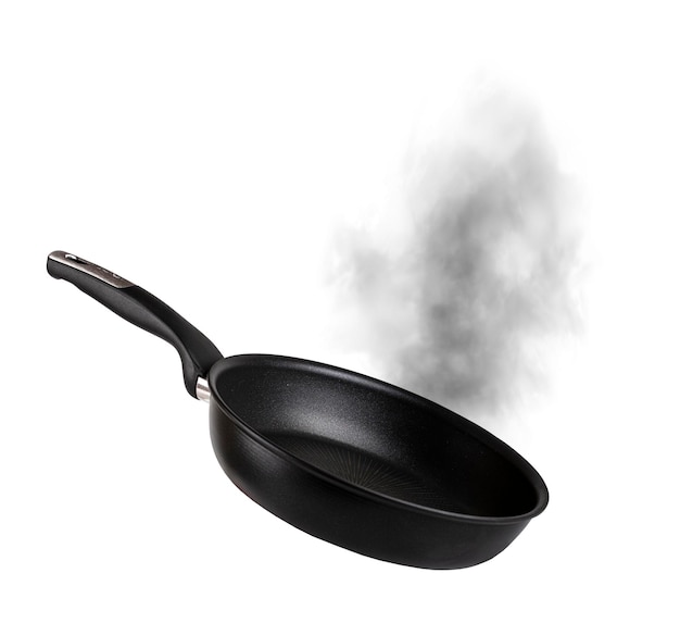 Empty frying pan and smoke isolated on white background