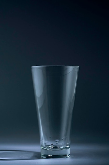 Empty Glass tumbler on black background