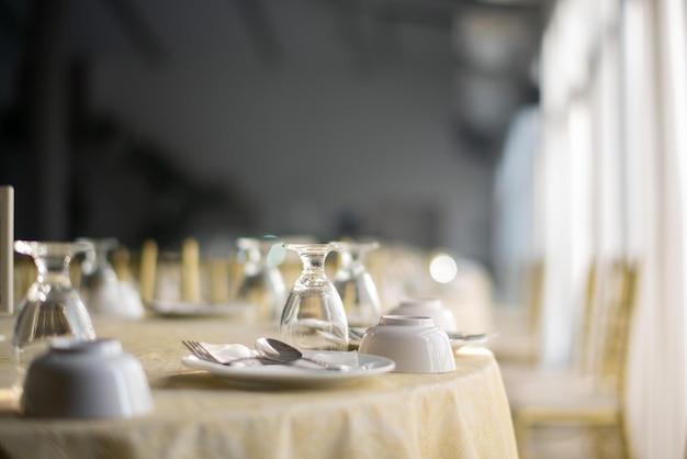 Empty glass of water on the table with blur background