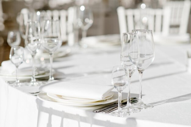 Empty glasses in restaurant Table setting for celebration