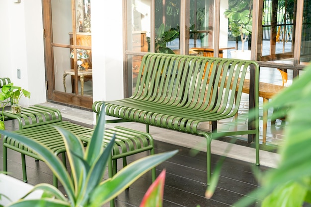 Empty green bench on balcony