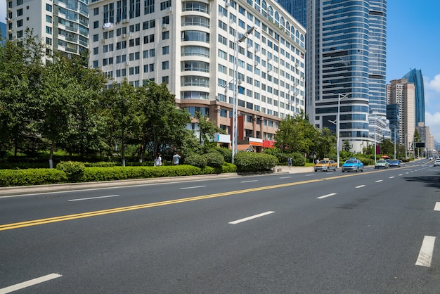 Empty highway with cityscape and skyline of qingdao,China.