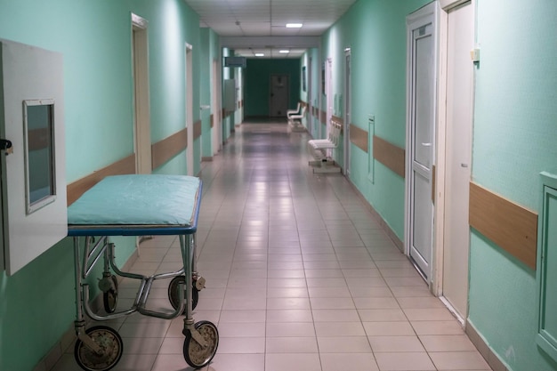 Empty hospital hall with white walls, medicine