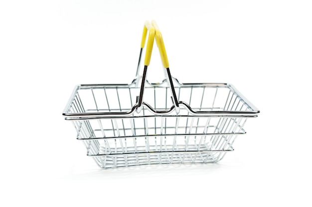 Empty iron shopping basket on white