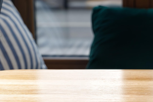 Empty Kitchen cafe restaurant background Wooden table top on blurred interior window background