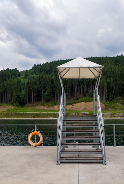 Empty Lake of Youth beach in Bukovel in summer