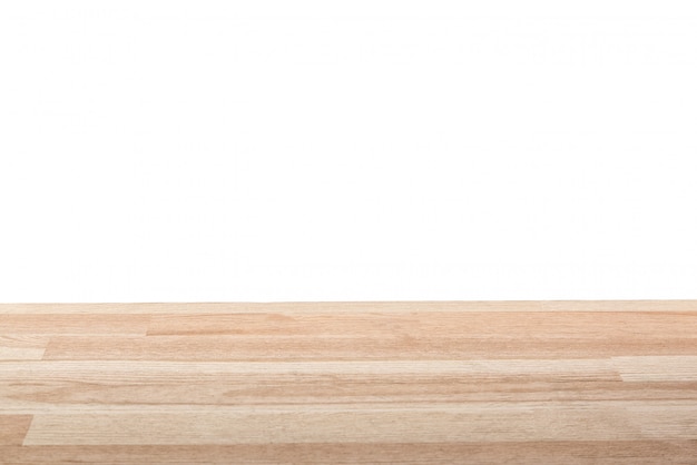 Empty light wood table top isolated on a white background